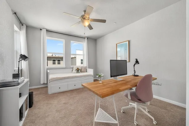 a bed room with a bed and a chandelier