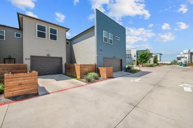a front view of a house with a garage