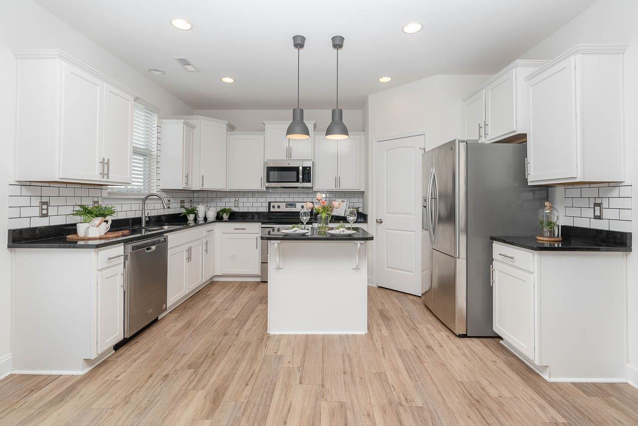 1612 Chestnut Falls Road Wendell, NC 27591 - Photo 6 of 19 GORGEOUS Kitchen is OPEN to the LIVING AREA & has a Pantry! Lots of Counter Space Too! Kitchen
