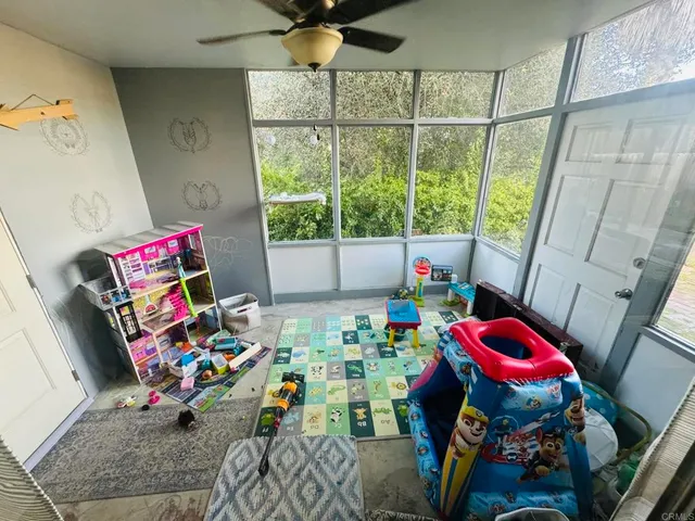 a kitchen with a sink a stove and refrigerator