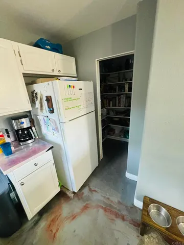 a room with storage and utility