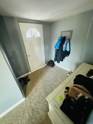 a view of living room and hardwood