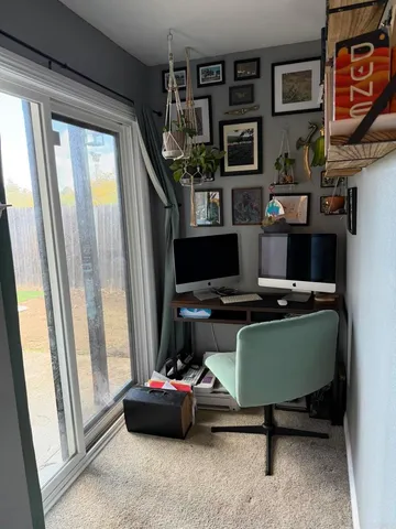 a room with toys and two windows