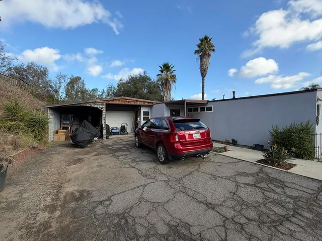 a view of a storage & utility room with a sink