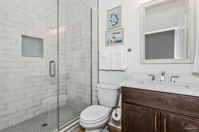 a en suite bathroom with a sink and a mirror