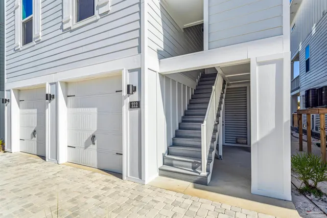 a view of a balcony with chairs