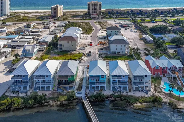 a view of a backyard with sitting area