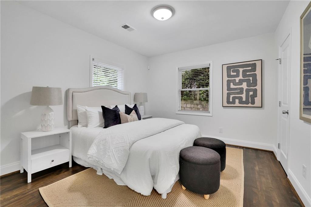 2222 Beecher Circle Southwest Atlanta, GA 30311 - Photo 27 of 33 a bedroom with a bed and a window