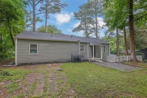 a view of a yard with a trees