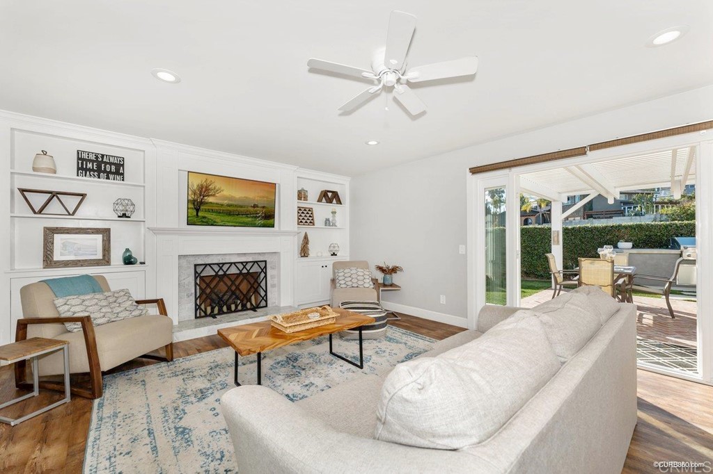 1815 Bailey Drive Oceanside, CA 92054 - Photo 13 of 34 a living room with furniture and a fireplace