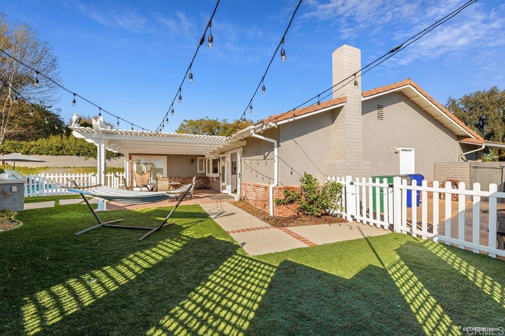 1815 Bailey Drive Oceanside, CA 92054 - Photo 31 of 34 a view of a house with backyard and porch