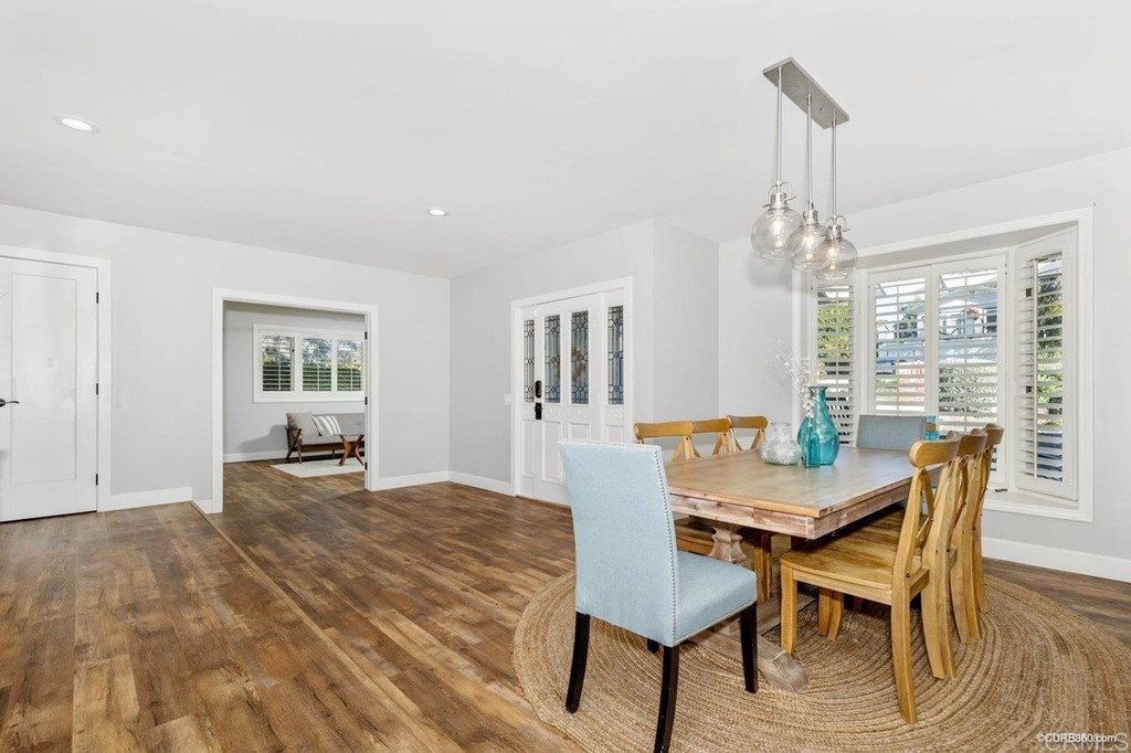 1815 Bailey Drive Oceanside, CA 92054 - Photo 6 of 34 a view of a dining room with furniture and chandelier