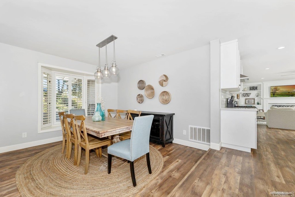 1815 Bailey Drive Oceanside, CA 92054 - Photo 7 of 34 a view of a dining room with furniture window and wooden floor