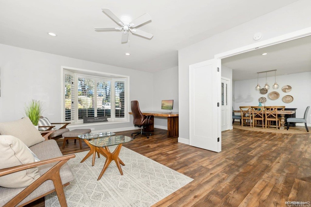 1815 Bailey Drive Oceanside, CA 92054 - Photo 8 of 34 a living room with furniture and a large window