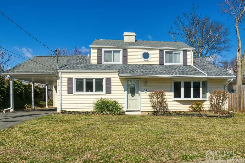 31 Windsor Road Edison, NJ 08817 - Photo 1 of 15 a front view of a house with a yard