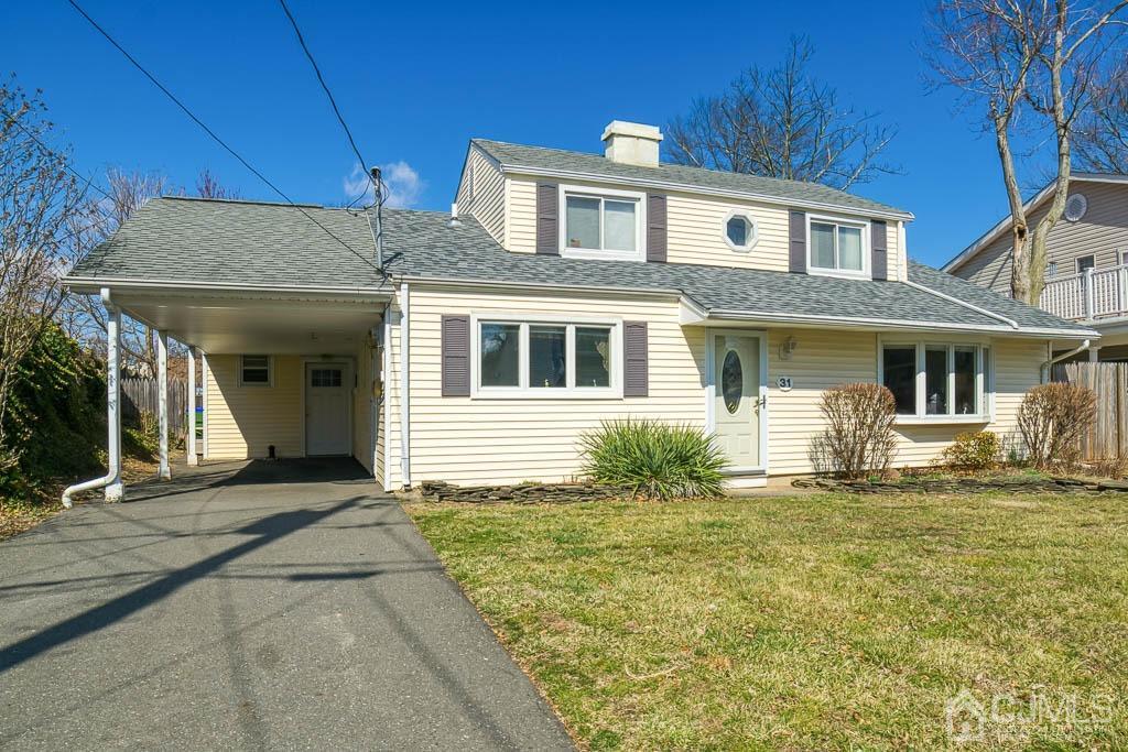 31 Windsor Road Edison, NJ 08817 - Photo 2 of 15 a front view of a house with a garden