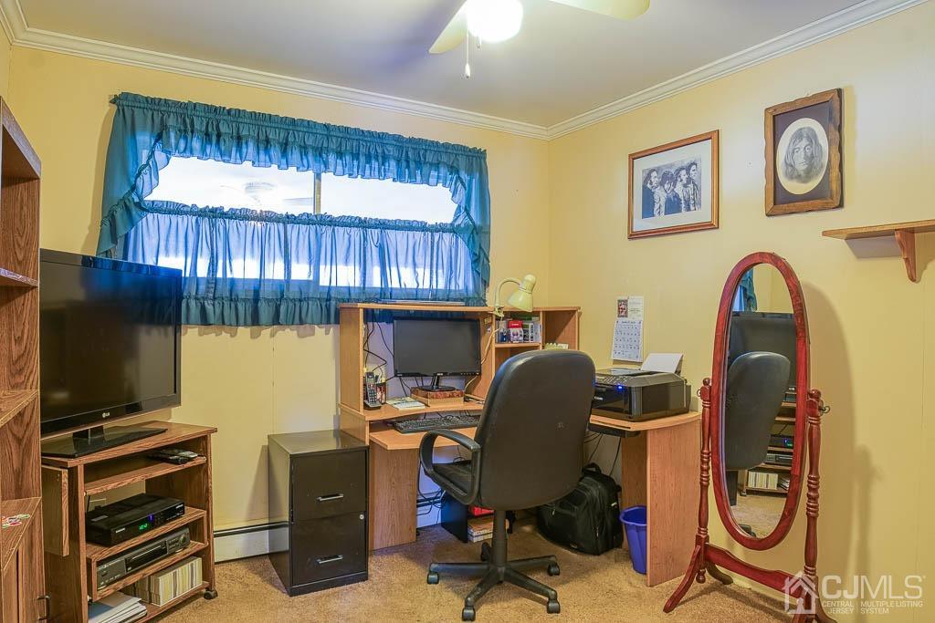 31 Windsor Road Edison, NJ 08817 - Photo 11 of 15 a view of a workspace with furniture