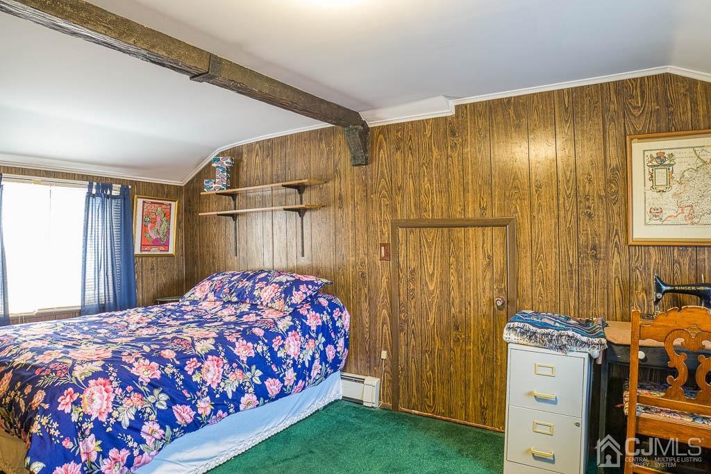 31 Windsor Road Edison, NJ 08817 - Photo 12 of 15 a bedroom with a bed and a dresser