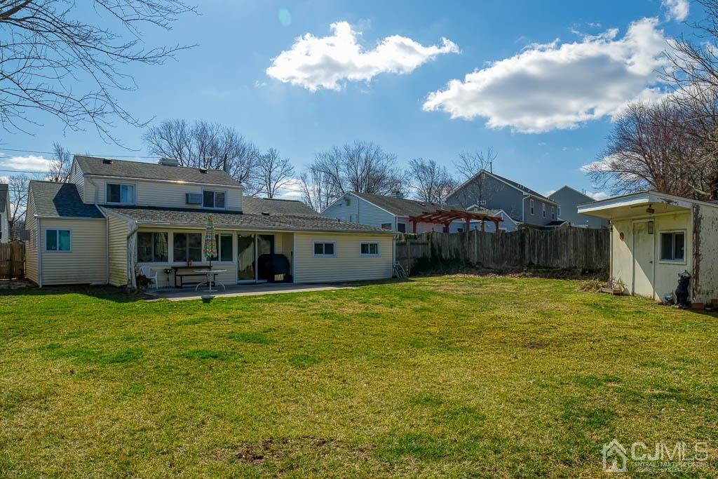 31 Windsor Road Edison, NJ 08817 - Photo 13 of 15 a front view of house with yard and seating area