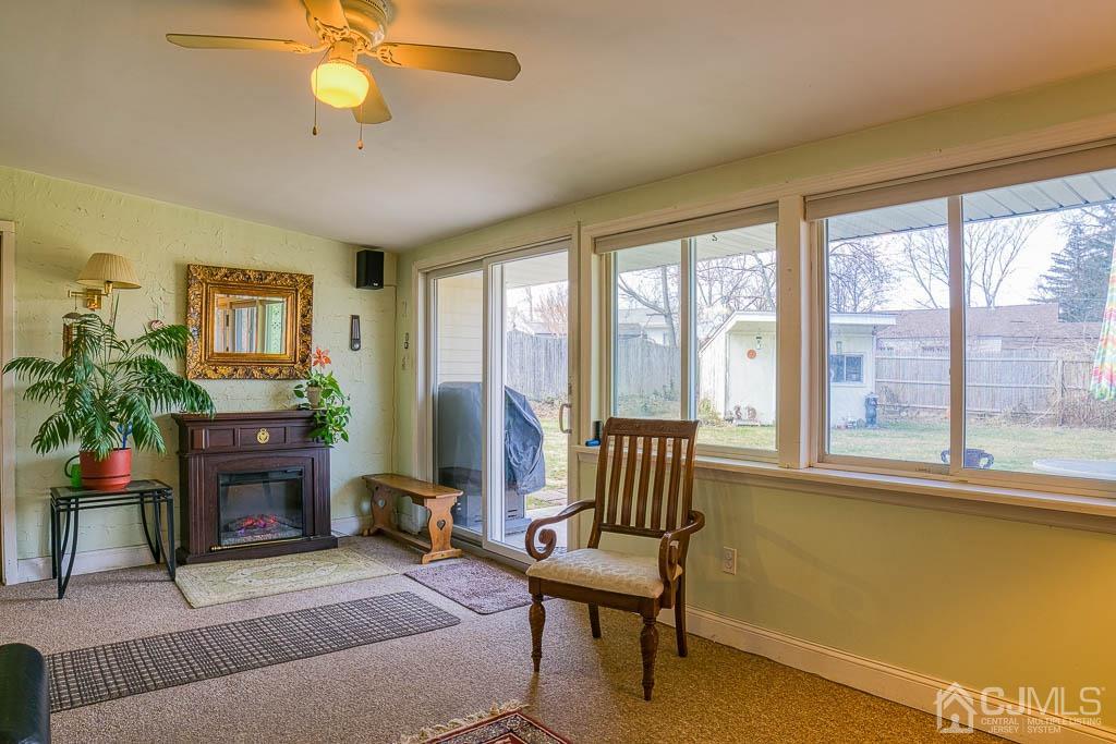 31 Windsor Road Edison, NJ 08817 - Photo 6 of 15 a living room with furniture and a fireplace