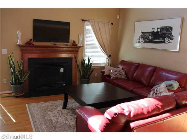 150 Stonburg Road Clemmons, NC 27012 - Photo 2 of 16 Living Room. Vaulted ceiling, gas logs and skylights make this a very comfortable, cozy room.