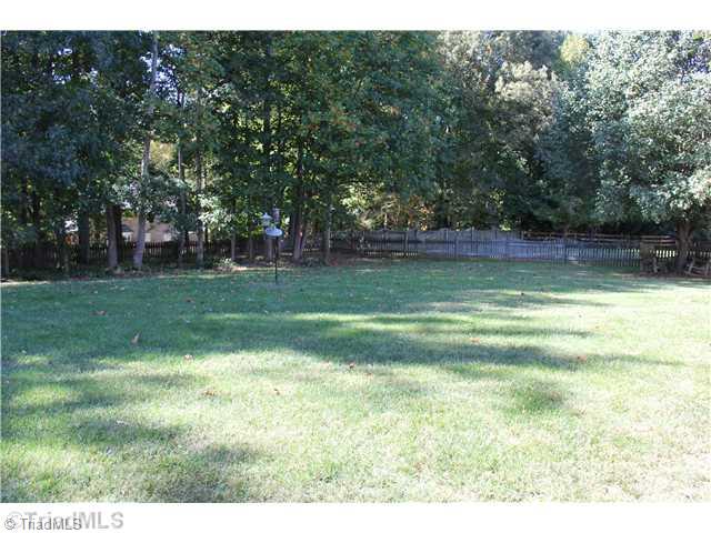 150 Stonburg Road Clemmons, NC 27012 - Photo 14 of 16 Yard/Garden. Beautifully landscaped, fenced back yard.