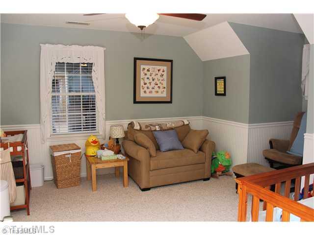 150 Stonburg Road Clemmons, NC 27012 - Photo 10 of 16 2nd Bedroom. One of the bedrooms upstairs. This one is currently used as a nursery. Both upstairs bedrooms have very large walk in closets and storage.