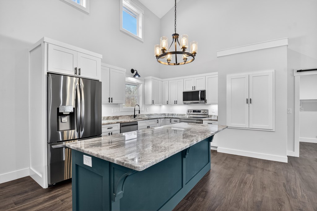 584 Brannon Nix Road Young Harris, GA 30582 - Photo 13 of 36 a kitchen with stainless steel appliances a sink and refrigerator