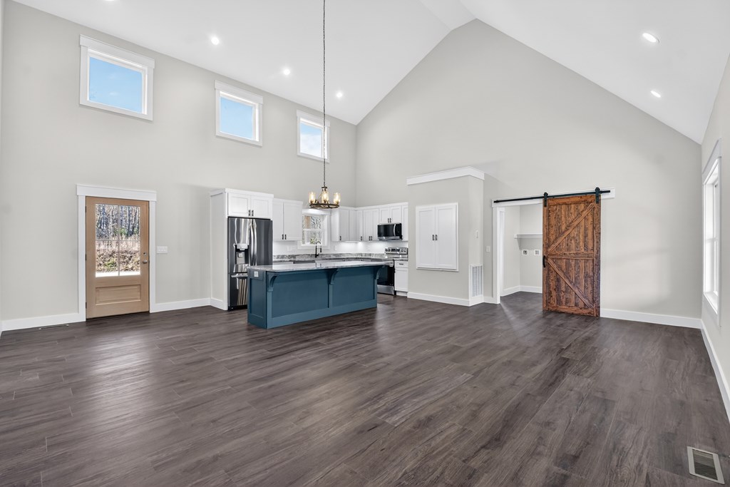 584 Brannon Nix Road Young Harris, GA 30582 - Photo 14 of 36 a view of kitchen with cabinets and wooden floor