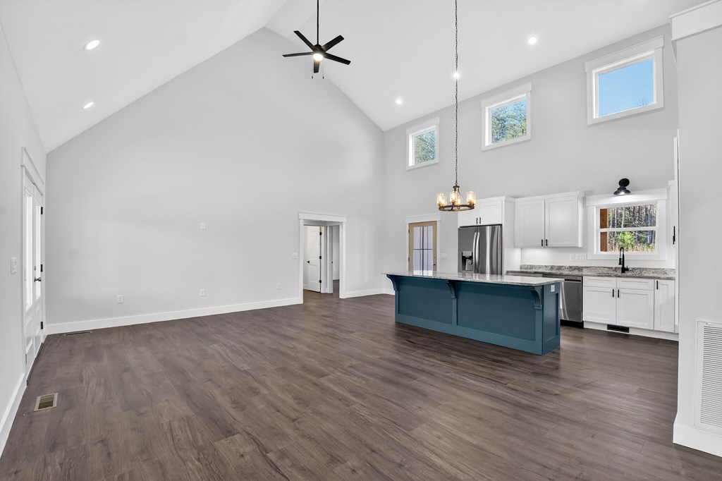 584 Brannon Nix Road Young Harris, GA 30582 - Photo 15 of 36 a room with wooden floor and furniture