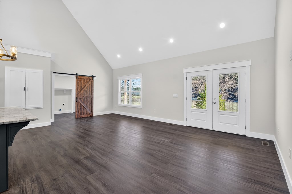 584 Brannon Nix Road Young Harris, GA 30582 - Photo 17 of 36 a view of a livingroom with wooden floor and window