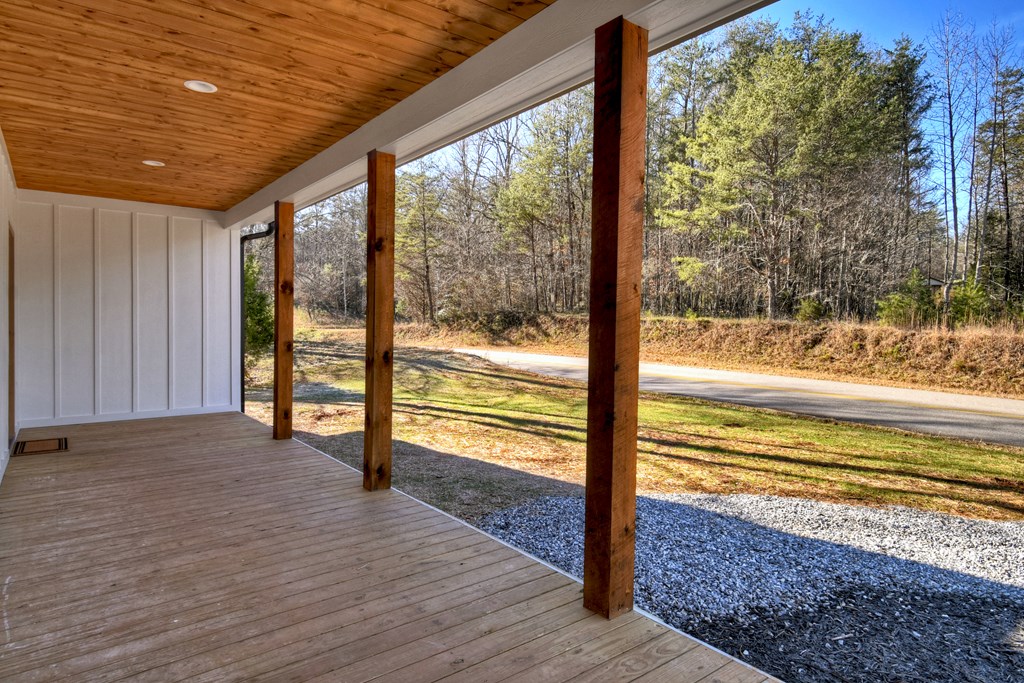 584 Brannon Nix Road Young Harris, GA 30582 - Photo 27 of 36 a view of a room with wooden floor and a porch