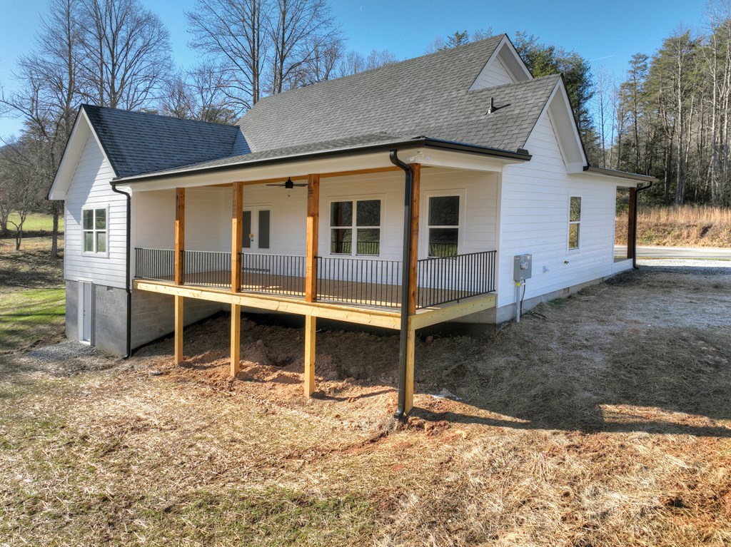 584 Brannon Nix Road Young Harris, GA 30582 - Photo 30 of 36 a view of a house with a yard and garage
