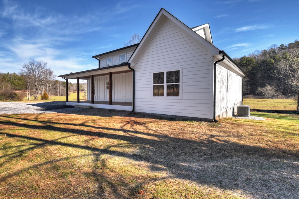 584 Brannon Nix Road Young Harris, GA 30582 - Photo 33 of 36 a view of a house with a yard