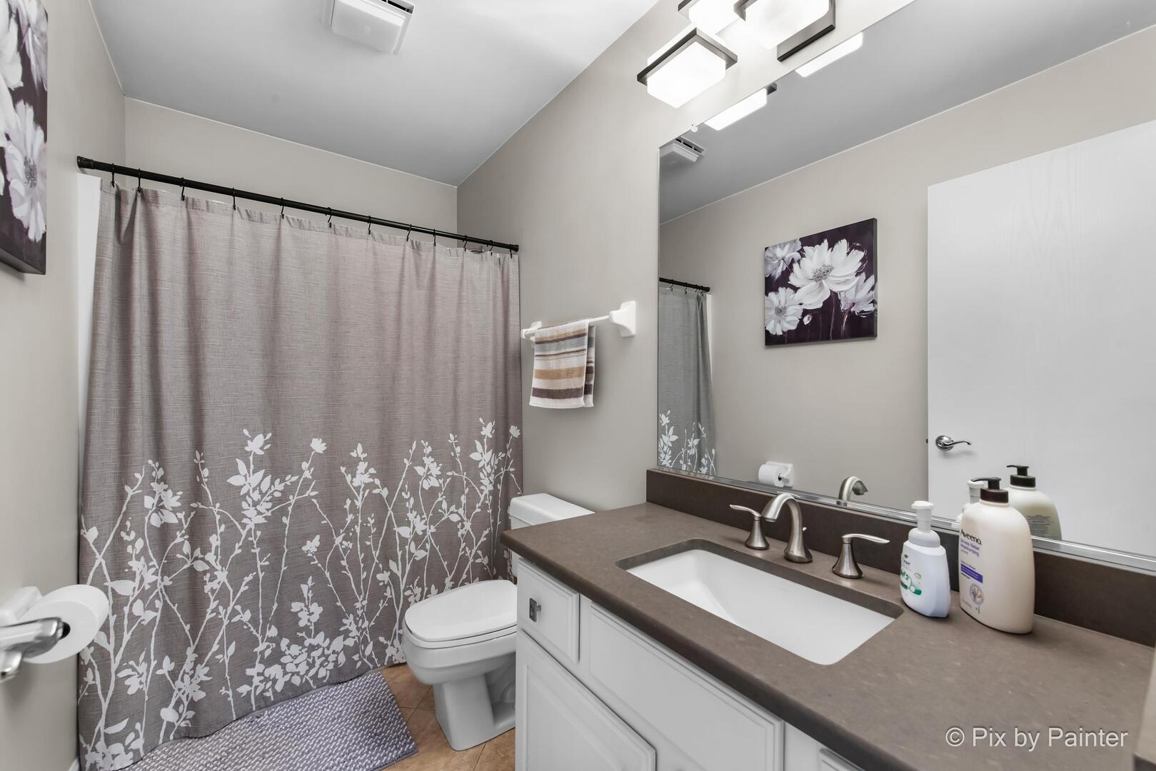 519 Shagbark Drive Elgin, IL 60123 - Photo 23 of 38 a bathroom with a granite countertop sink vanity mirror and toilet