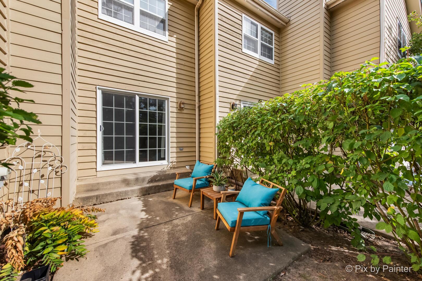 519 Shagbark Drive Elgin, IL 60123 - Photo 29 of 38 a backyard of a house with outdoor seating