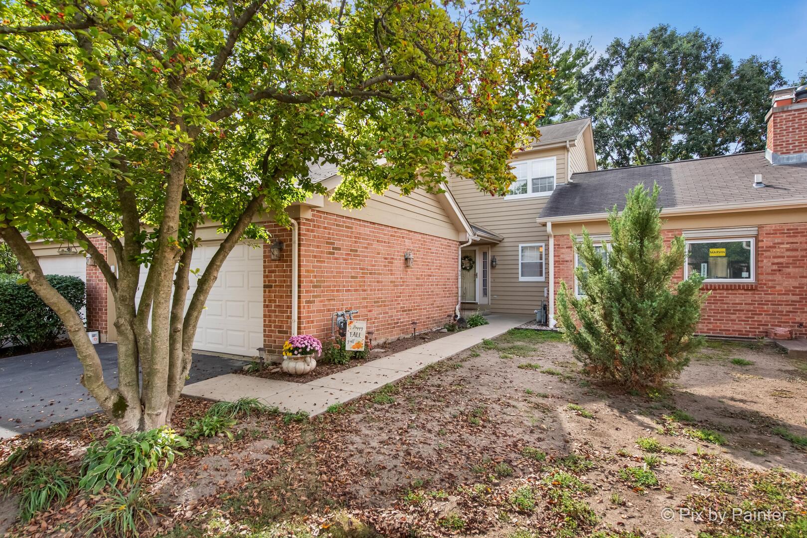 519 Shagbark Drive Elgin, IL 60123 - Photo 3 of 38 a front view of a house with a yard