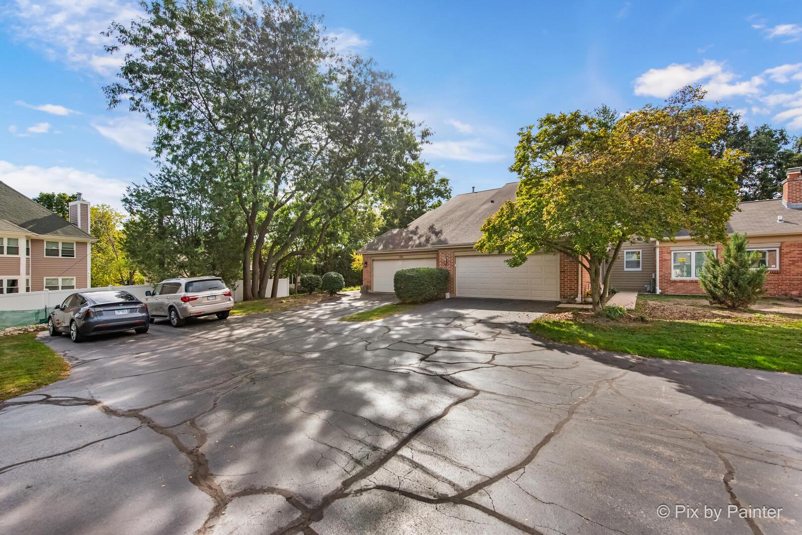 519 Shagbark Drive Elgin, IL 60123 - Photo 34 of 38 a view of a car parked in front of a house