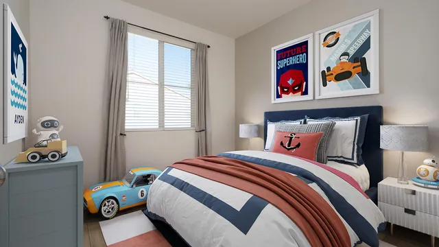 a bedroom with two beds and a painting on the wall