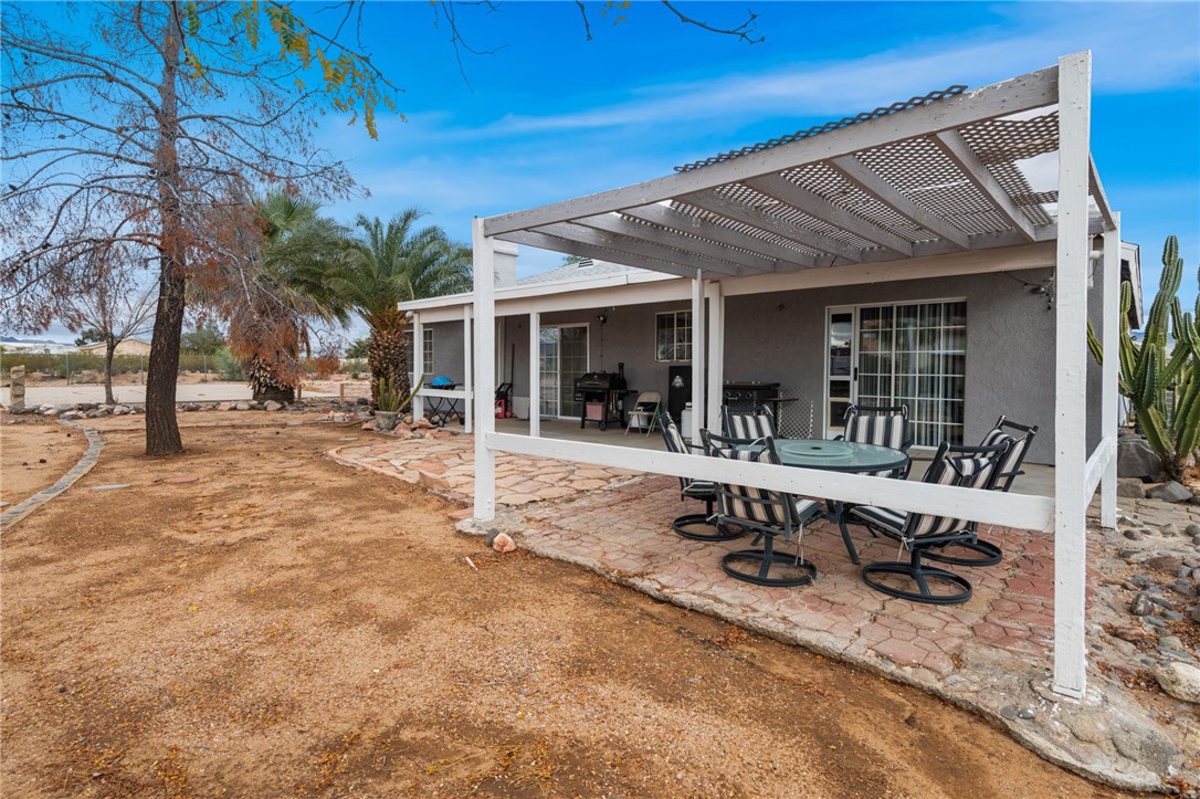 3633 Milky Way Road Golden Valley, AZ 86413 - Photo 8 of 28 pellet smoker, a propane smoker, grill and propane BBQ and patio furniture included
