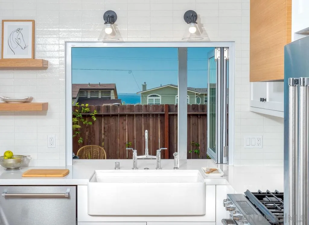 1710 Legaye Drive Cardiff, CA 92007 - Photo 14 of 43 a bathroom with a sink and a mirror