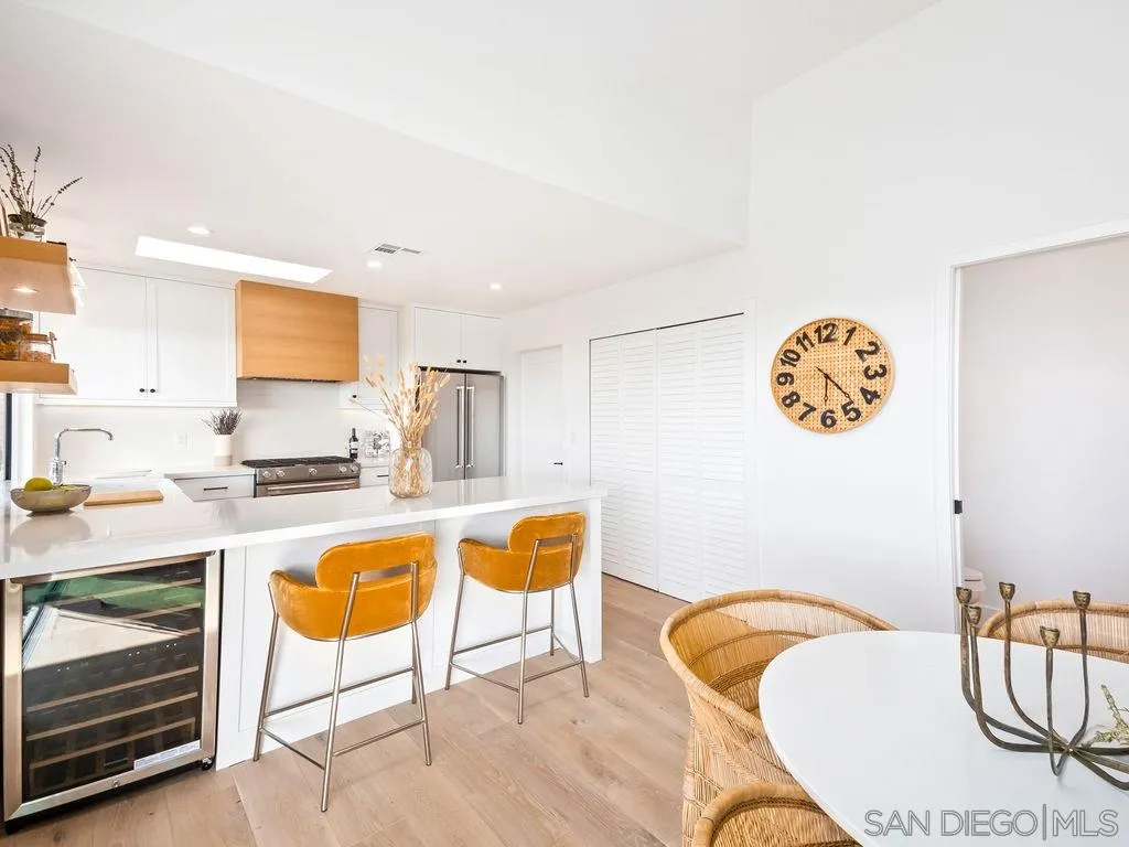 1710 Legaye Drive Cardiff, CA 92007 - Photo 18 of 43 a living room with granite countertop furniture and a table