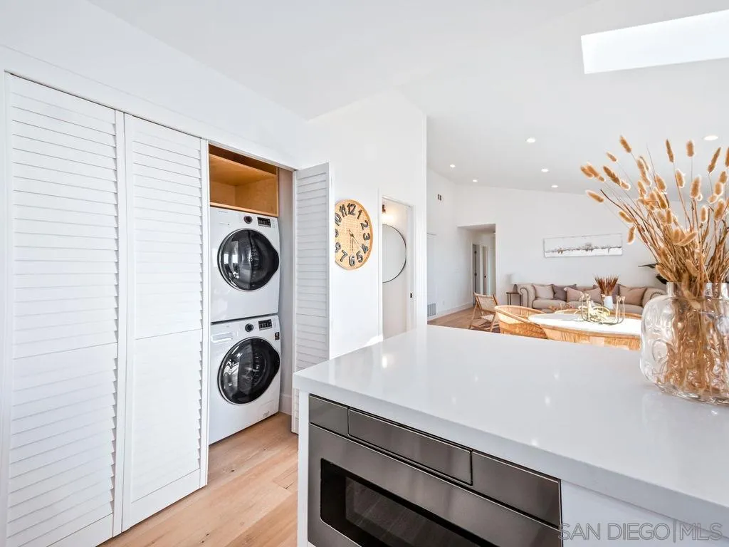 1710 Legaye Drive Cardiff, CA 92007 - Photo 21 of 43 a view of living room with washer and dryer