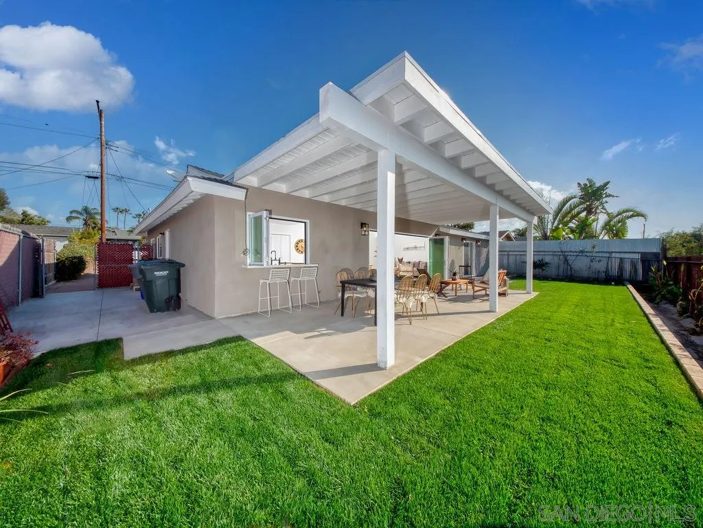 1710 Legaye Drive Cardiff, CA 92007 - Photo 24 of 43 a view of a house with a backyard and a patio