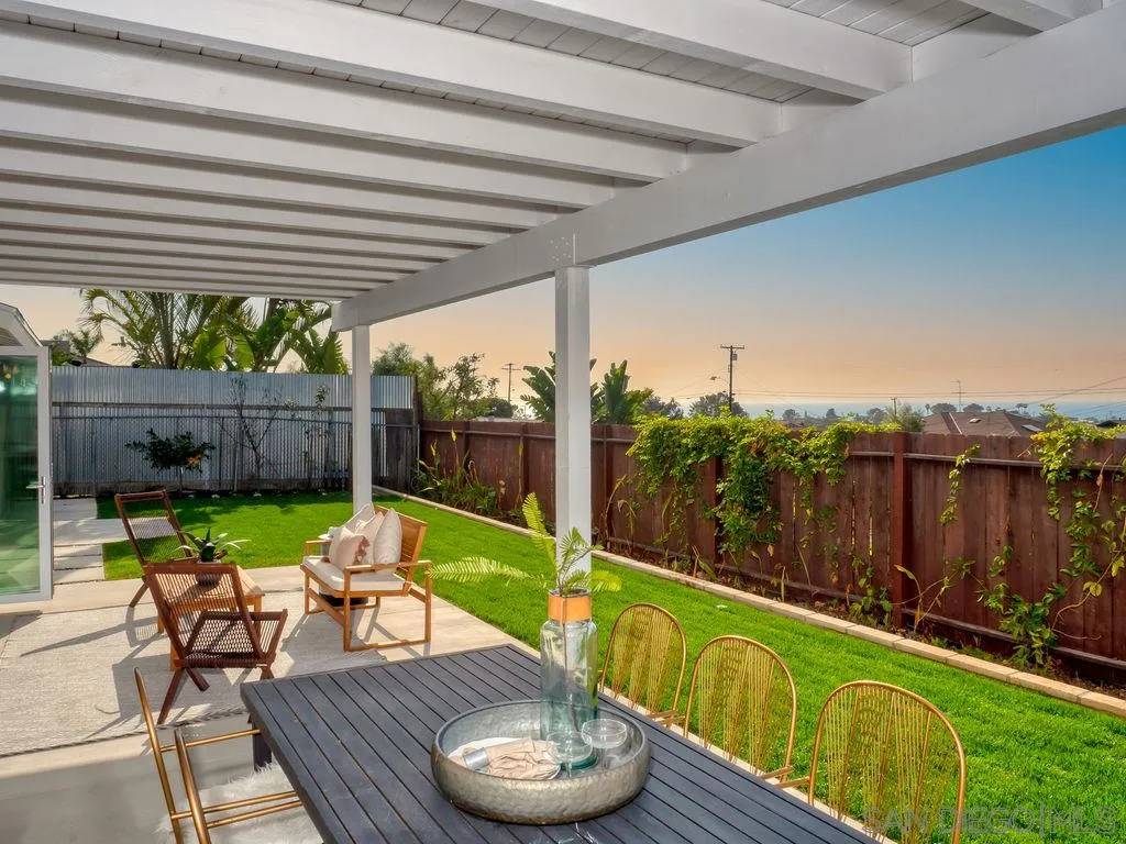 1710 Legaye Drive Cardiff, CA 92007 - Photo 3 of 43 a view of a chair and tables in the backyard