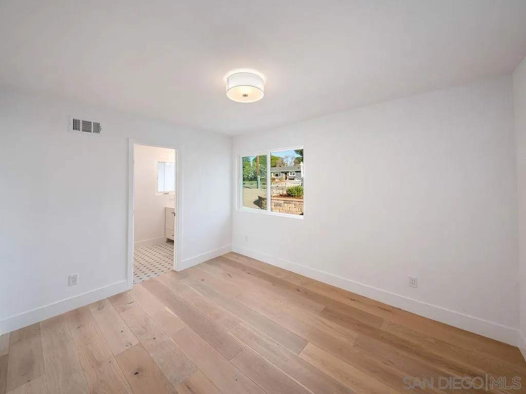 1710 Legaye Drive Cardiff, CA 92007 - Photo 31 of 43 an empty room with windows