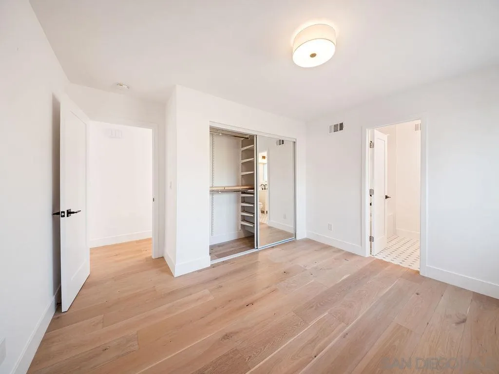 1710 Legaye Drive Cardiff, CA 92007 - Photo 33 of 43 a view of empty room with wooden floor