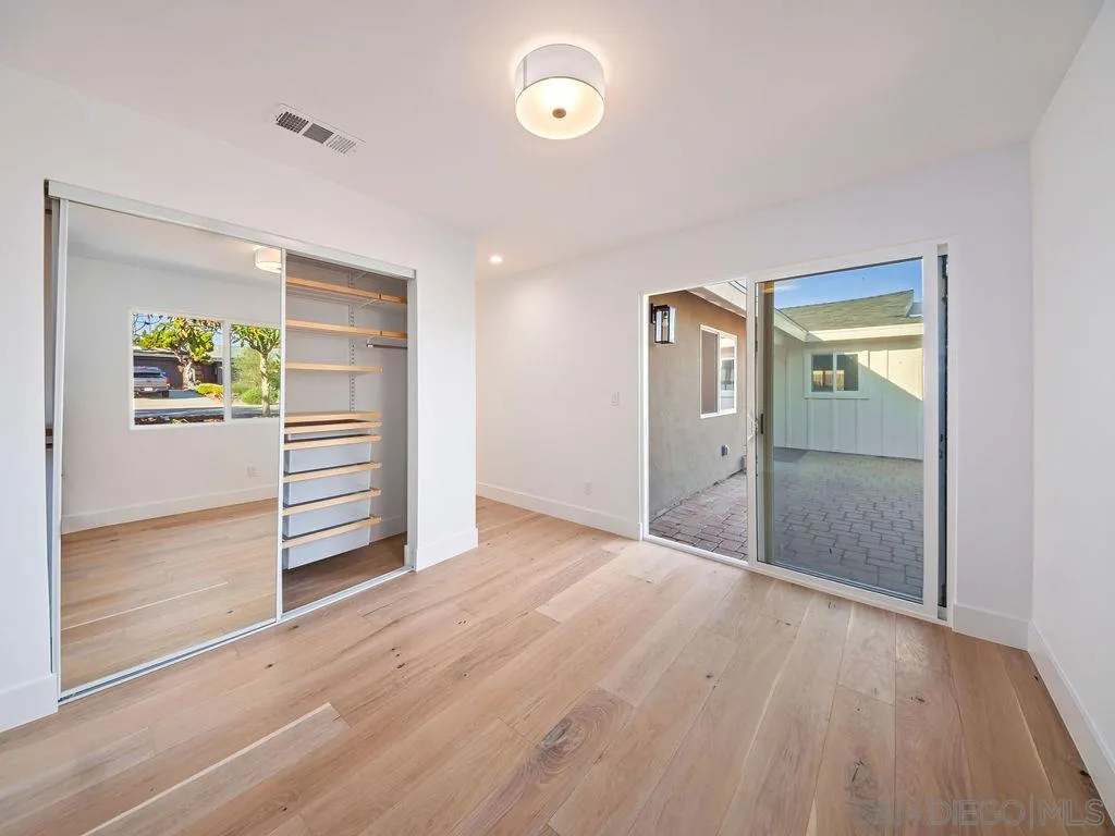 1710 Legaye Drive Cardiff, CA 92007 - Photo 34 of 43 an empty room with windows and closet