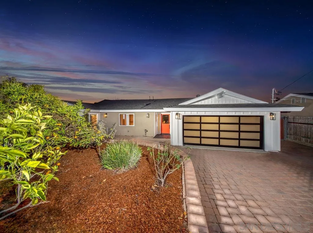 1710 Legaye Drive Cardiff, CA 92007 - Photo 41 of 43 a front view of a house with a yard and garage