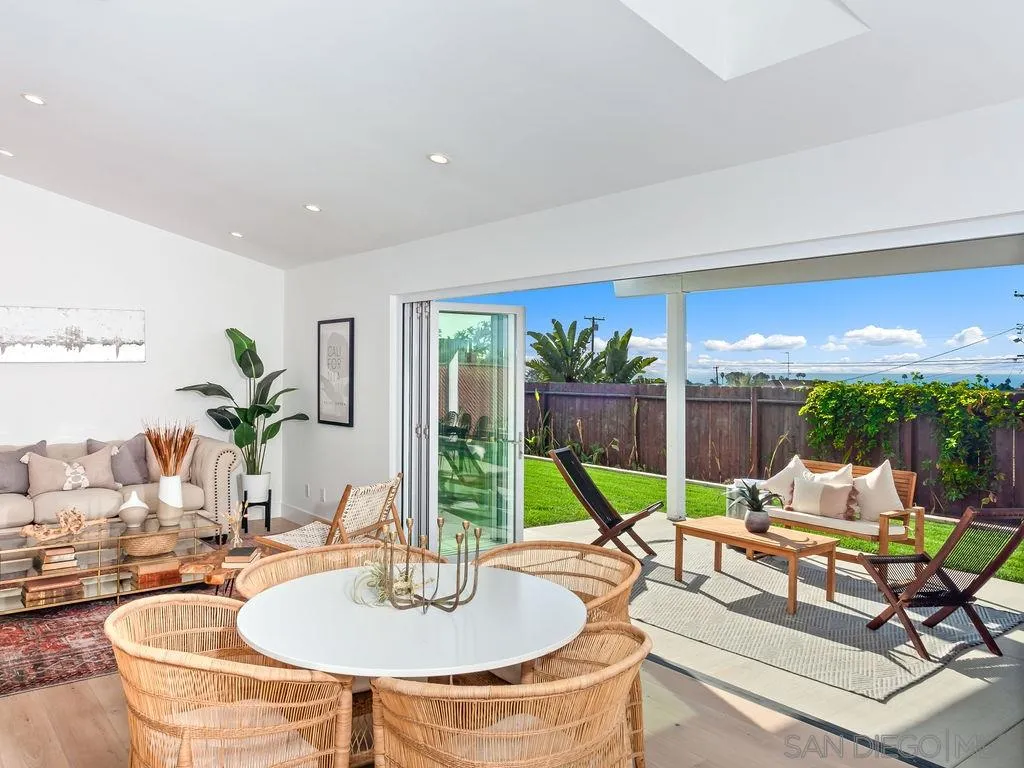 1710 Legaye Drive Cardiff, CA 92007 - Photo 9 of 43 a living room with patio furniture and a potted plants